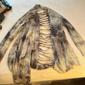 Tie dye cut out overtop love culture